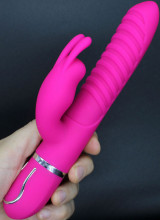 Vibratore Rabbit Fucsia in Silicone con Rilievi Stimolanti 22 x 3,5 cm.